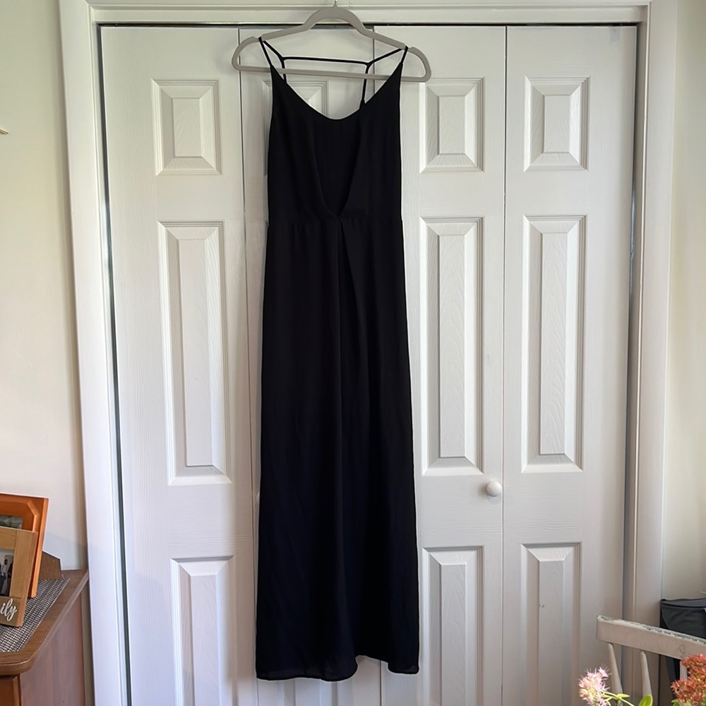 Black maxi dress with sheer overlay. V back with spaghetti straps